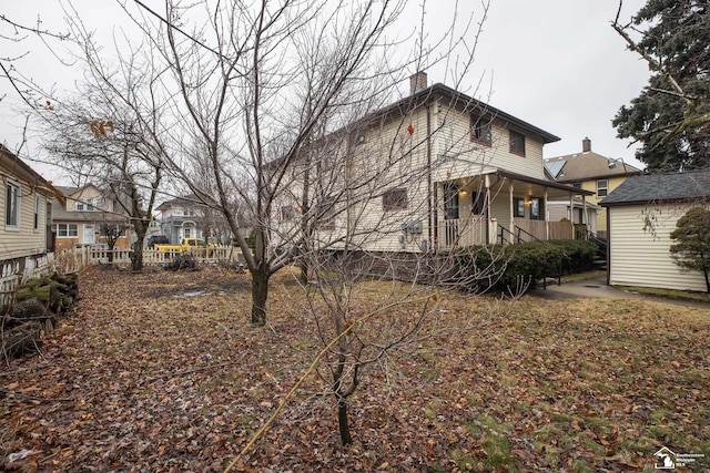 exterior space featuring a chimney