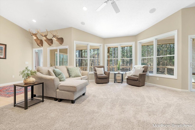 carpeted living area with vaulted ceiling, recessed lighting, a ceiling fan, and baseboards