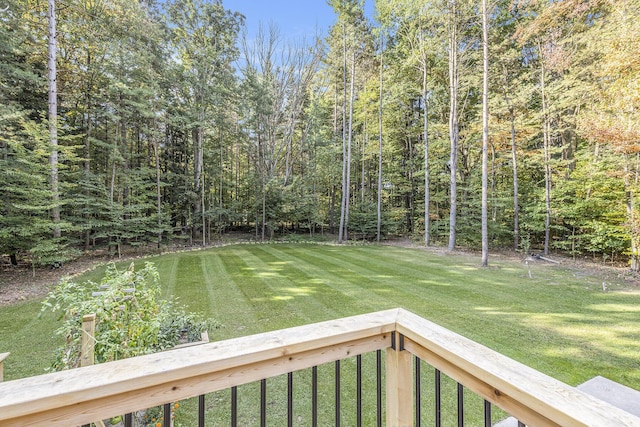 view of yard featuring a wooded view