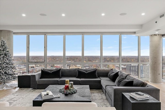 living room featuring recessed lighting and light wood-style floors