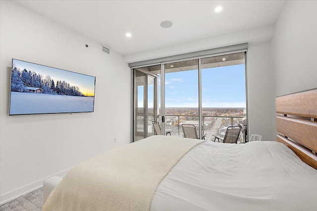 bedroom with recessed lighting, visible vents, baseboards, and access to outside