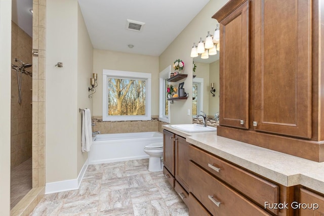 full bathroom with visible vents, a garden tub, toilet, a tile shower, and vanity