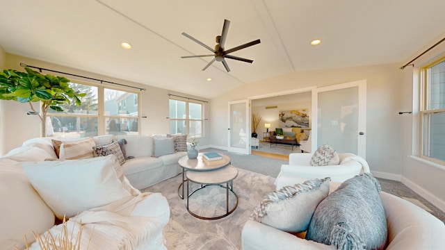 carpeted living area with recessed lighting, baseboards, a ceiling fan, and vaulted ceiling