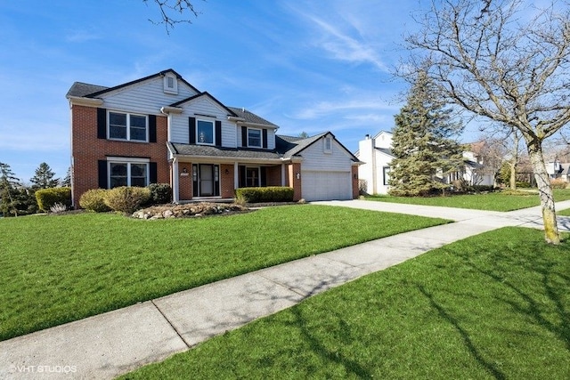 view of front facade with a front lawn, an attached garage, brick siding, and driveway