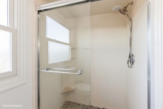 bathroom with a stall shower