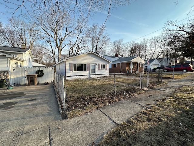 bungalow with a fenced front yard