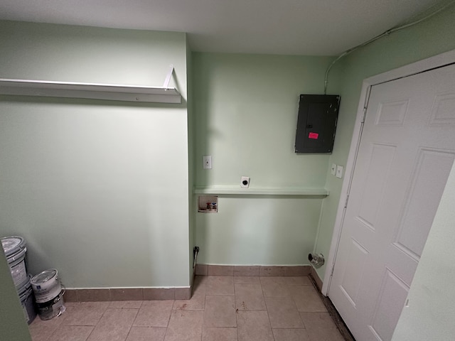 clothes washing area with tile patterned flooring, electric panel, laundry area, hookup for a washing machine, and hookup for an electric dryer