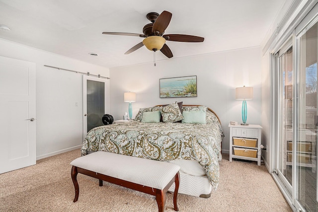 carpeted bedroom with baseboards and ceiling fan