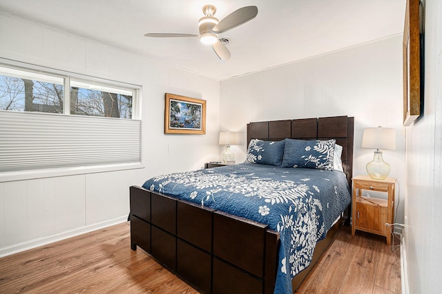 bedroom featuring ceiling fan and wood finished floors