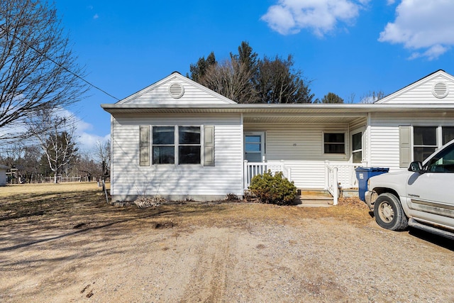 single story home featuring a porch