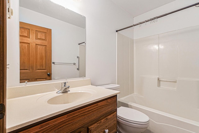 full bath featuring shower / bath combination, toilet, and vanity