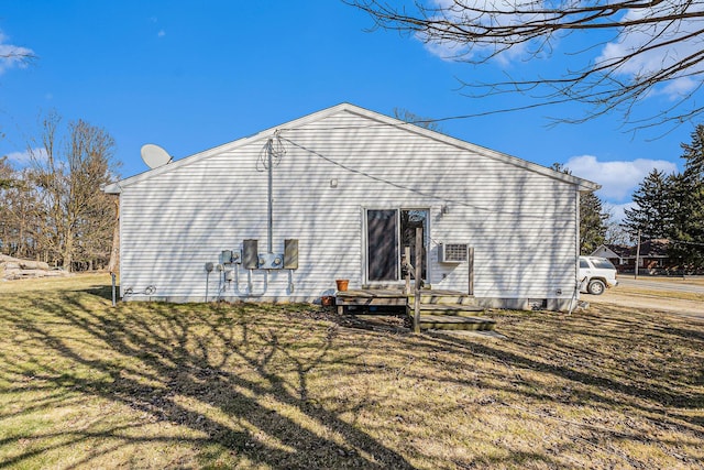 back of house with a yard