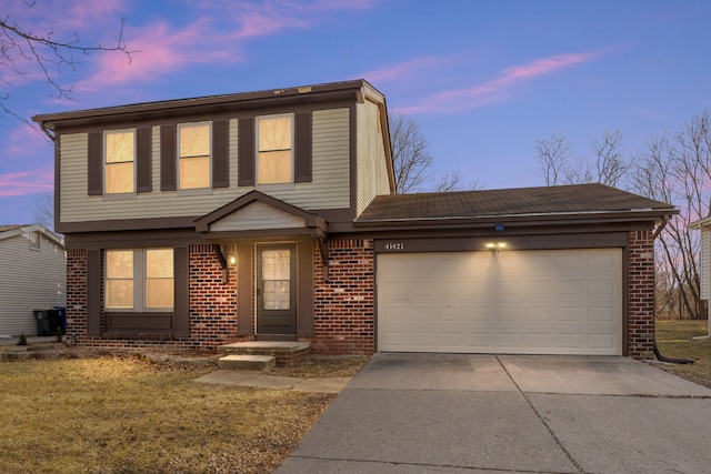 view of front of property with driveway, brick siding, roof with shingles, and an attached garage