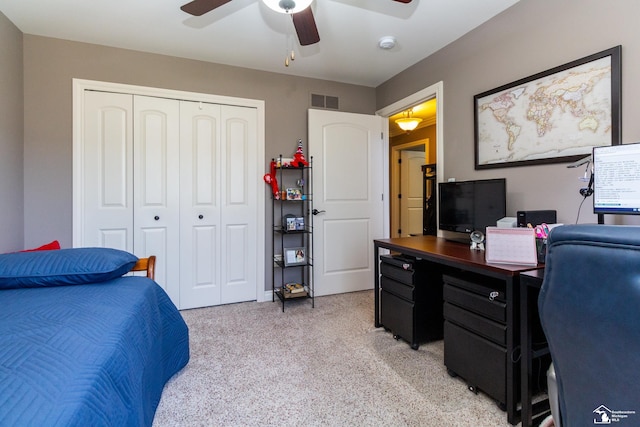 bedroom with visible vents, a closet, and a ceiling fan