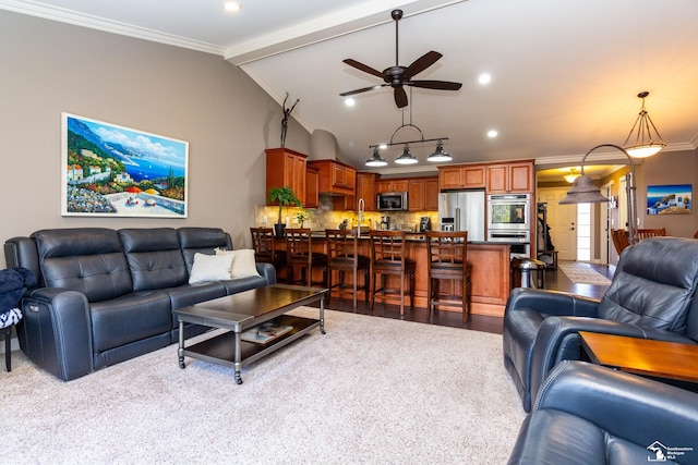 living room featuring beamed ceiling, recessed lighting, crown molding, and a ceiling fan