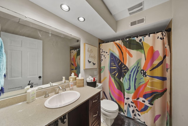 bathroom featuring recessed lighting, visible vents, toilet, and vanity