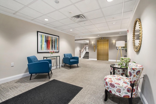 building lobby with visible vents and stairs