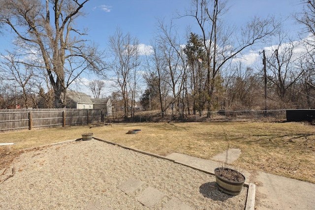 view of yard with a fenced backyard