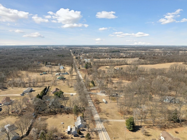 birds eye view of property with a rural view