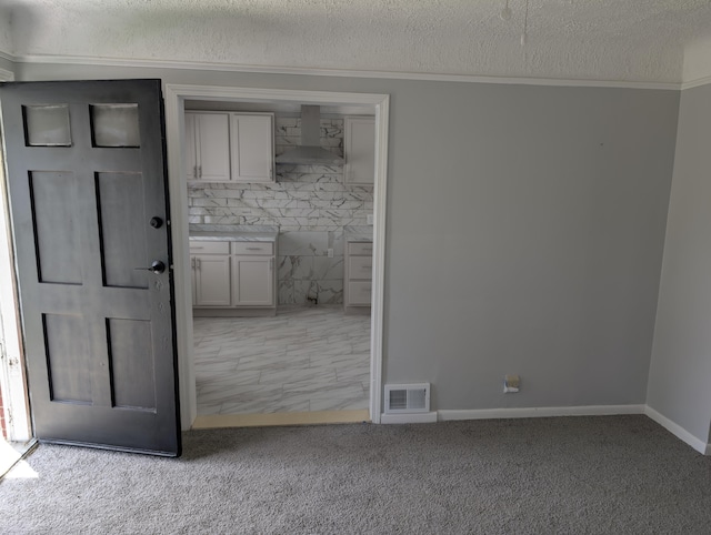 870 Capitol Ave, Lincoln Park, MI 48146 - unfurnished bedroom featuring ornamental molding, carpet, a textured ceiling, and baseboards
