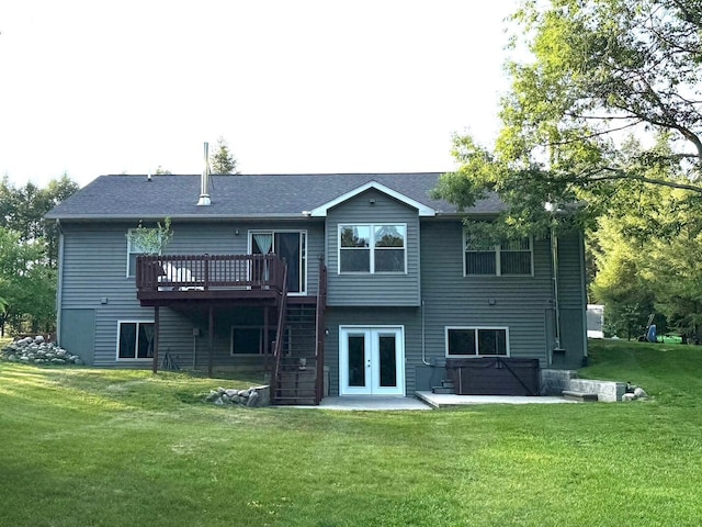 1357 W M-20, New Era, MI 49446 - back of property with a hot tub, french doors, a wooden deck, a yard, and a patio area