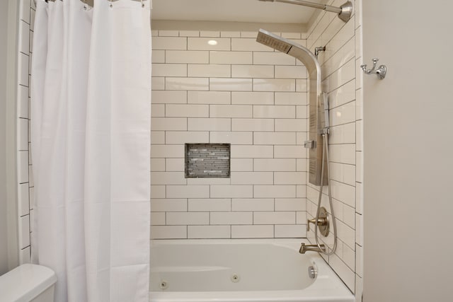 full bathroom with toilet and shower / tub combo with curtain