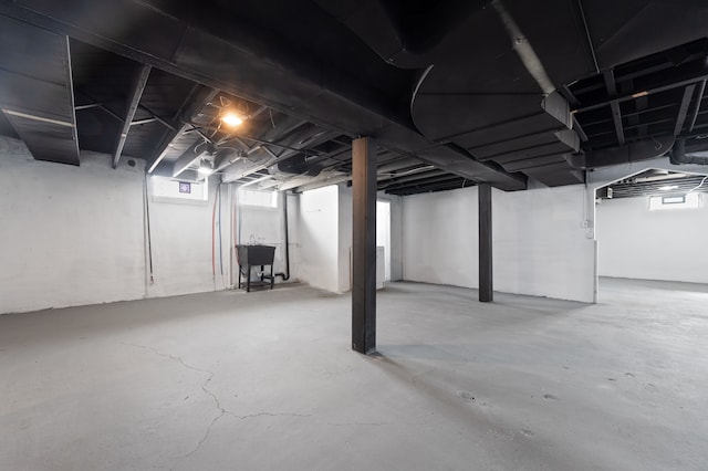 basement featuring a sink