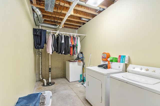 washroom featuring independent washer and dryer