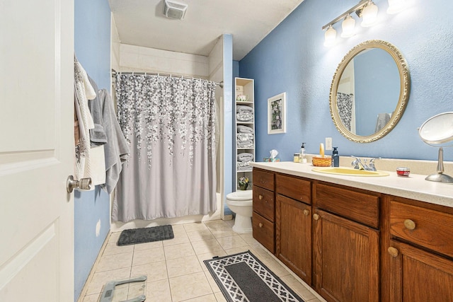 full bathroom with tile patterned floors, toilet, vanity, and a shower with curtain