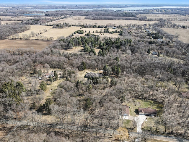 birds eye view of property with a rural view