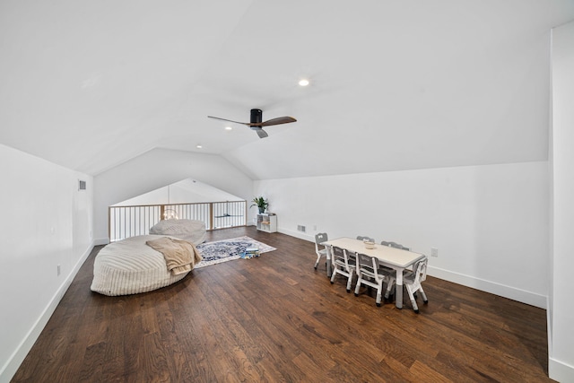 bedroom featuring vaulted ceiling, wood finished floors, and baseboards