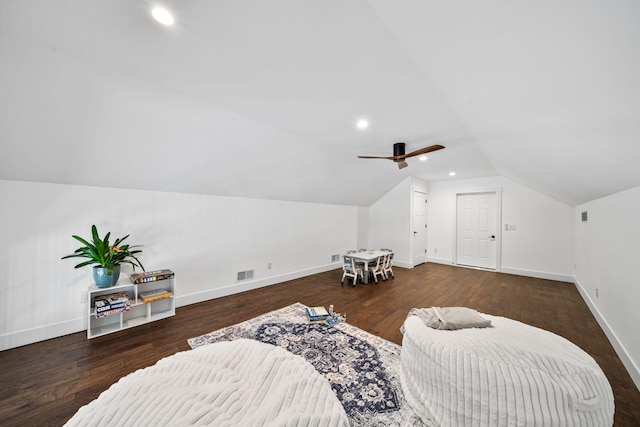 sitting room with visible vents, wood finished floors, recessed lighting, baseboards, and lofted ceiling