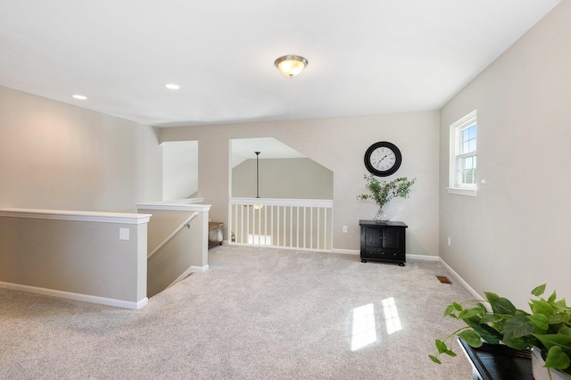 interior space featuring carpet flooring, recessed lighting, and baseboards