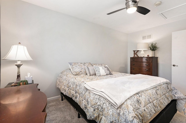 carpeted bedroom featuring baseboards, visible vents, and ceiling fan