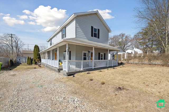 farmhouse featuring covered porch