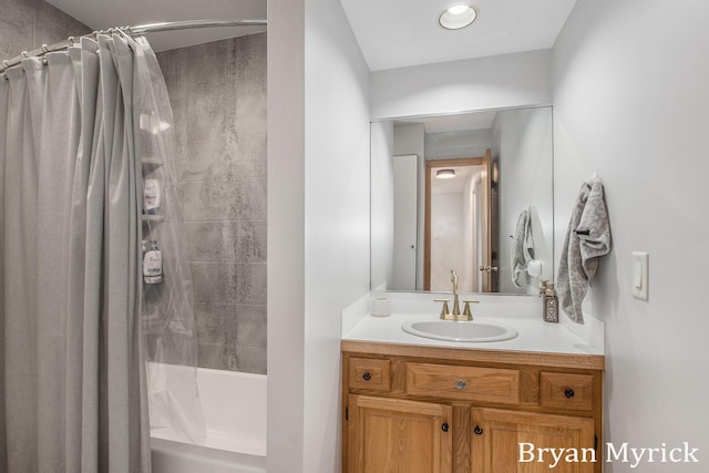 full bathroom with vanity and shower / bath combo with shower curtain