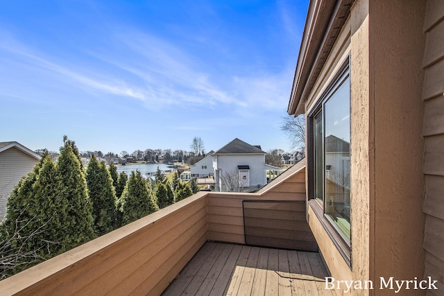 balcony featuring a water view