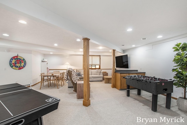 recreation room featuring visible vents, recessed lighting, and light colored carpet