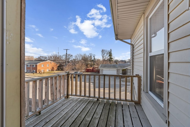 wooden deck featuring a residential view