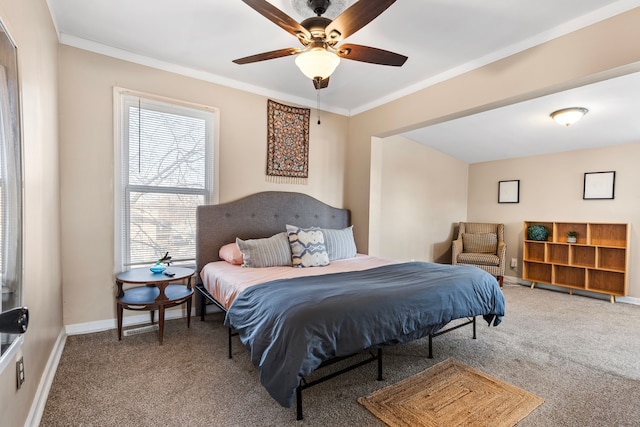 bedroom with crown molding, a ceiling fan, baseboards, and carpet floors