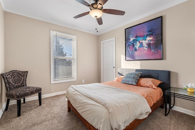 bedroom featuring ceiling fan, baseboards, and carpet floors