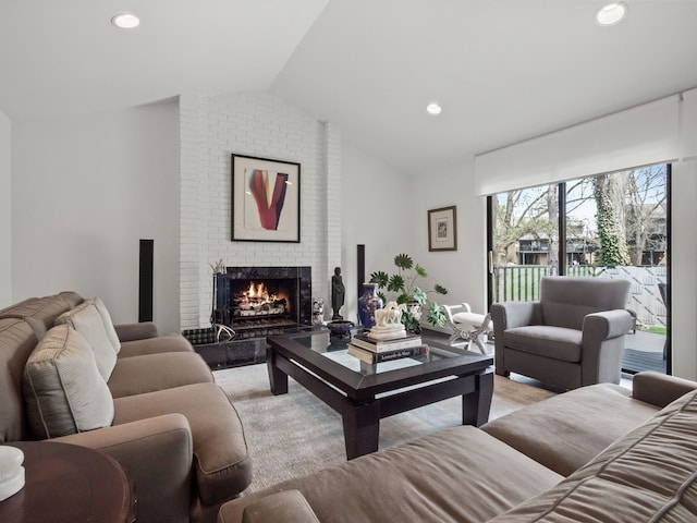 1920 Pine Ridge Ln, Bloomfield Hills, MI 48302 - living room with lofted ceiling, a brick fireplace, and recessed lighting