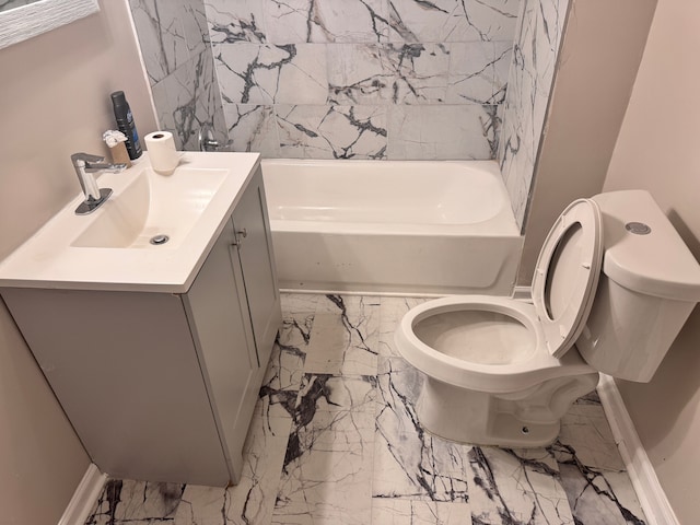 bathroom with baseboards, toilet, marble finish floor, and vanity