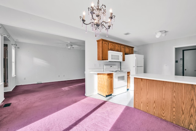 kitchen with visible vents, light colored carpet, white appliances, and light countertops