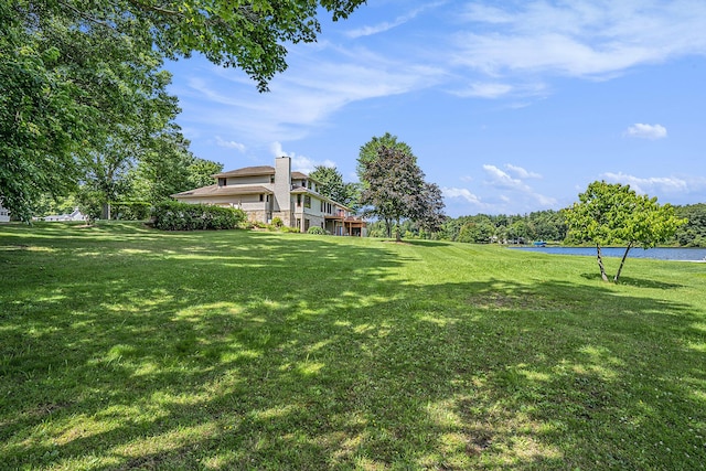 view of yard with a water view