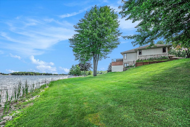 view of yard with a water view