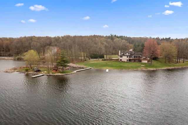 view of water feature featuring a forest view