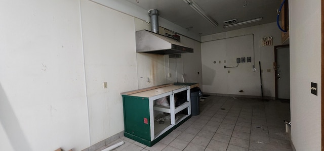 kitchen featuring a wood stove