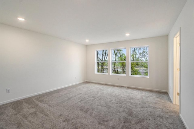5227 Brinson Ln, Kalamazoo, MI 49009 - spare room with carpet flooring, recessed lighting, and baseboards