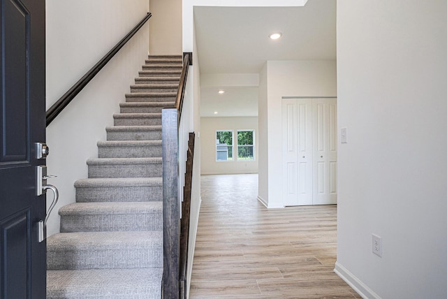 5227 Brinson Ln, Kalamazoo, MI 49009 - stairs with wood finished floors and recessed lighting